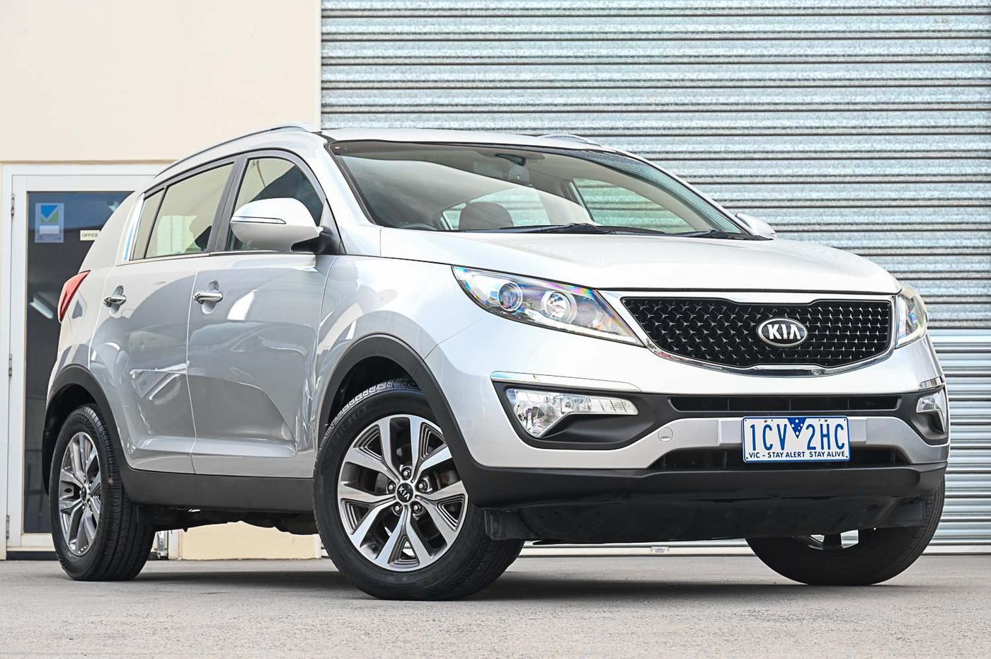 Kia Sportage in silver — front three-quarter view at the Ripper Cars showroom in Springvale
