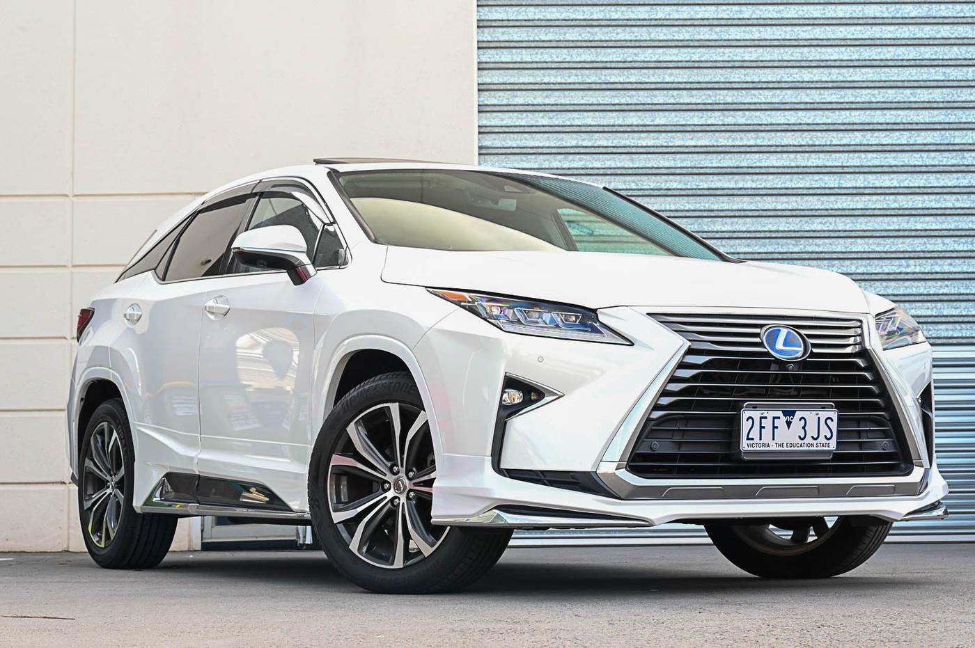 Lexus RX450h in white — front three-quarter view at the Ripper Cars showroom in Springvale