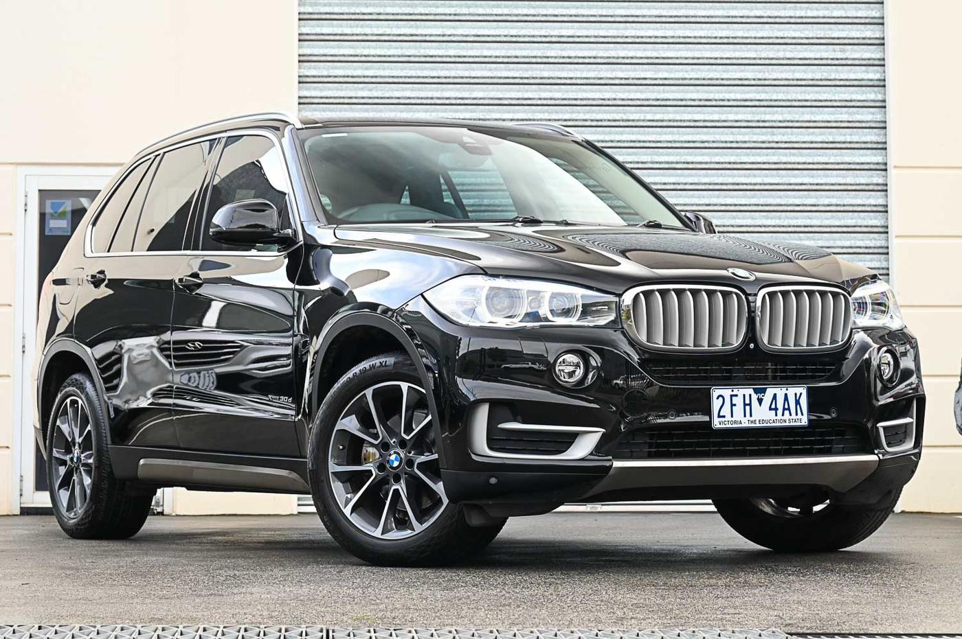 BMW X5 xDrive30d in black — front three-quarter view at the Ripper Cars showroom in Springvale