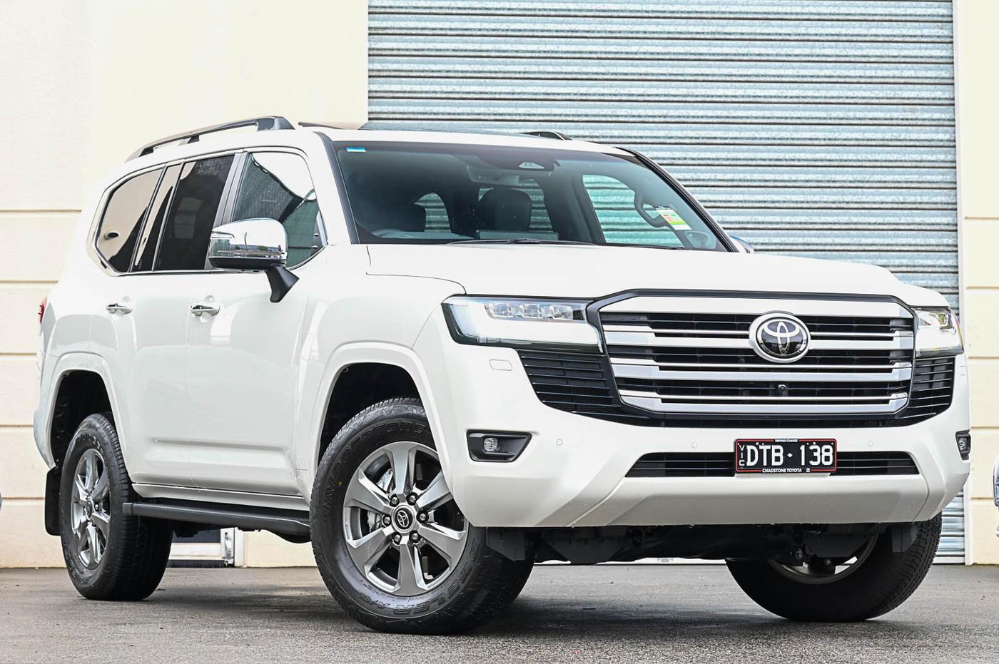 Toyota LandCruiser in white — front three-quarter view at the Ripper Cars showroom in Springvale