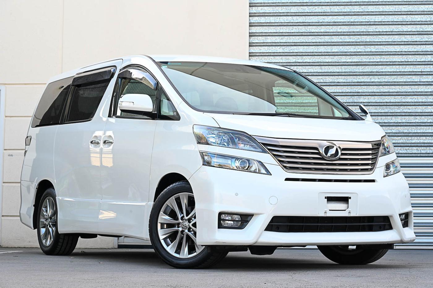 Toyota Vellfire V6 in white — front three-quarter view at the Ripper Cars showroom in Springvale